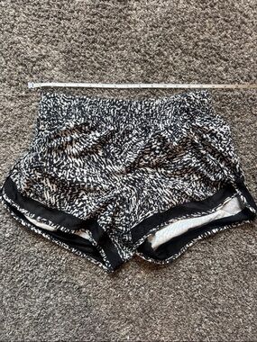 Athleta Black & White Run Racer with mesh 4” Running Shorts